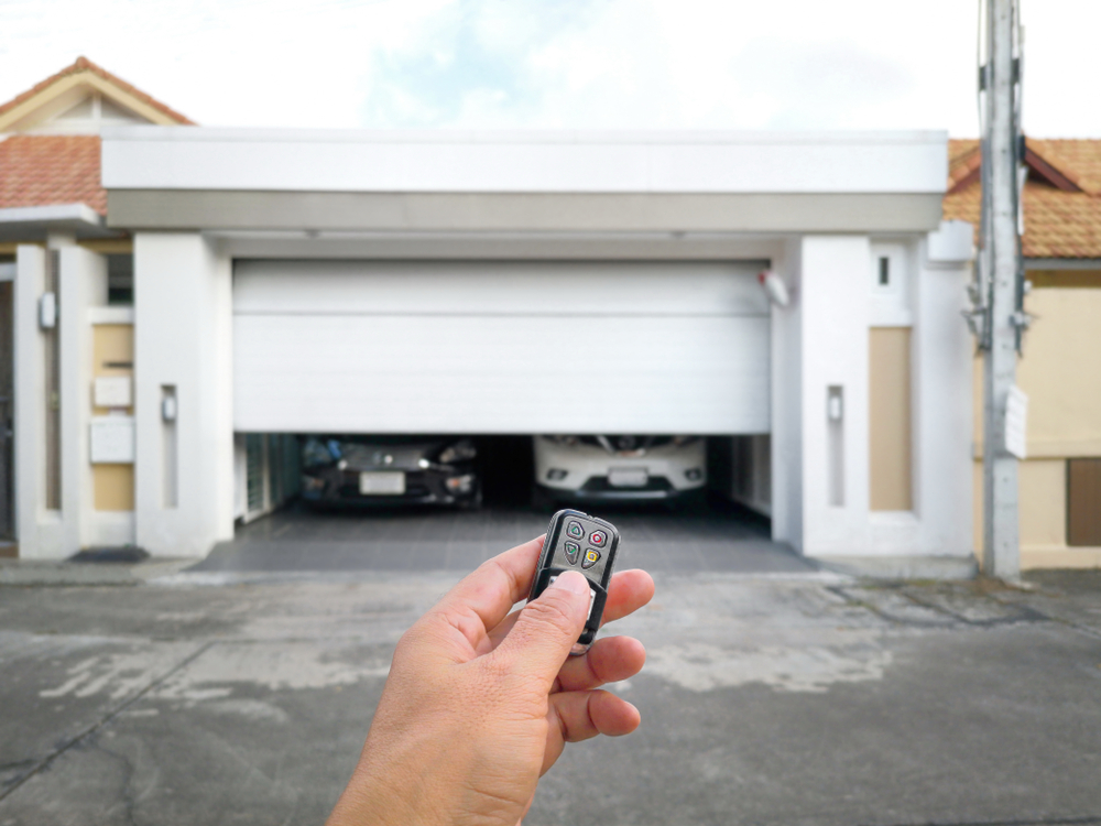 A modern garage door equipped with an automatic opener, showcasing the convenience of remote-controlled access.